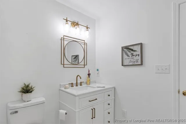a view of a bathroom from a hallway