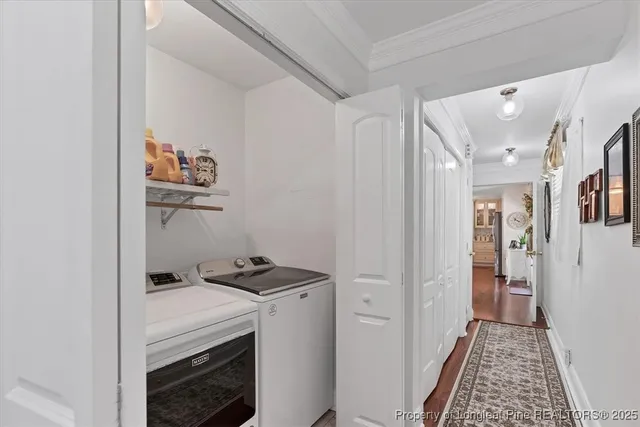 a bedroom with a bed couch and window