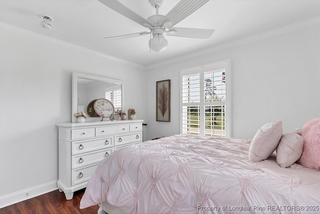 2483 West Carthage Road Lumberton, NC 28360 - Photo 40 of 50 a bedroom with a large bed and a dresser