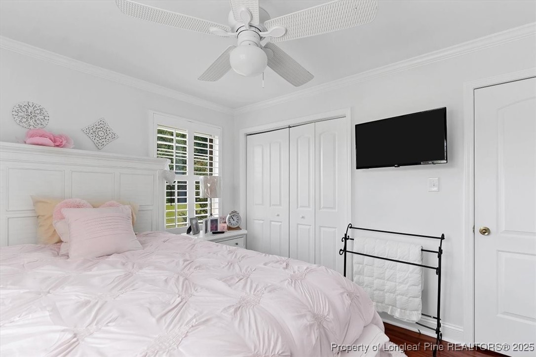 2483 West Carthage Road Lumberton, NC 28360 - Photo 41 of 50 a bedroom with a bed a television and a window