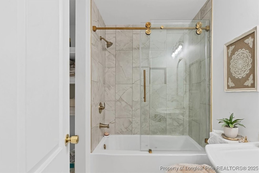 2483 West Carthage Road Lumberton, NC 28360 - Photo 43 of 50 a bathroom with a bathtub and shower
