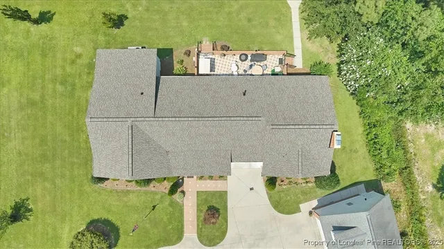 a front view of house with an outdoor space and seating