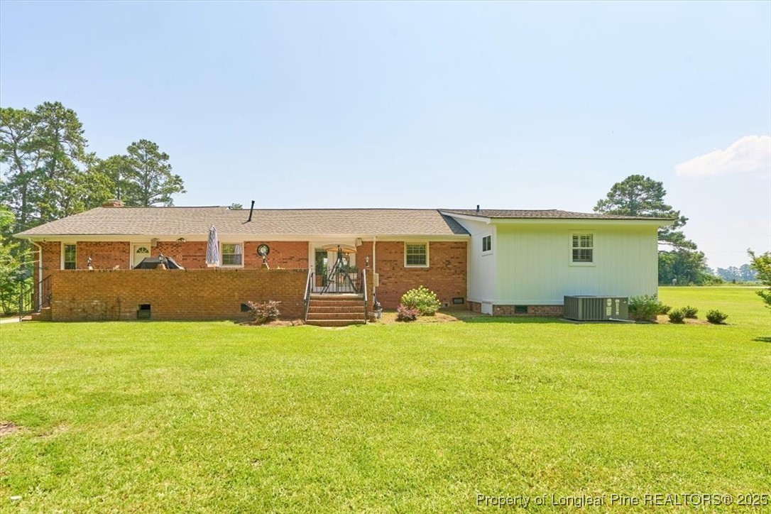 2483 West Carthage Road Lumberton, NC 28360 - Photo 50 of 50 a view of a pool with an outdoor space and seating area