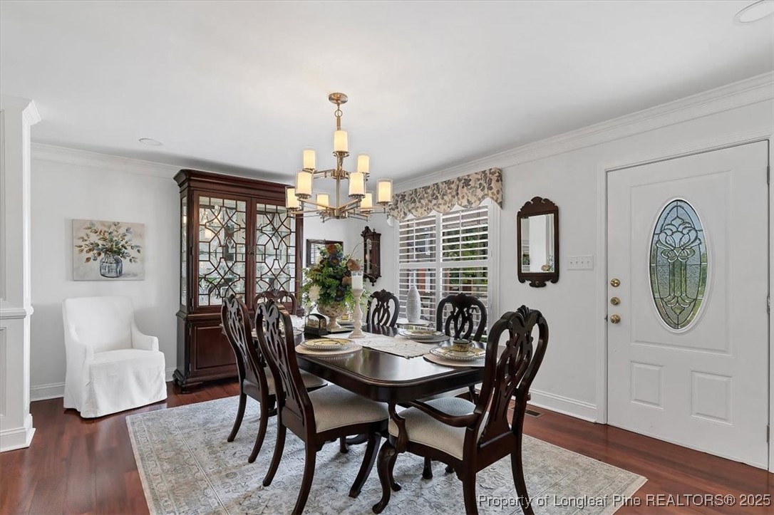 2483 West Carthage Road Lumberton, NC 28360 - Photo 8 of 50 a view of a dining room with furniture window and wooden floor