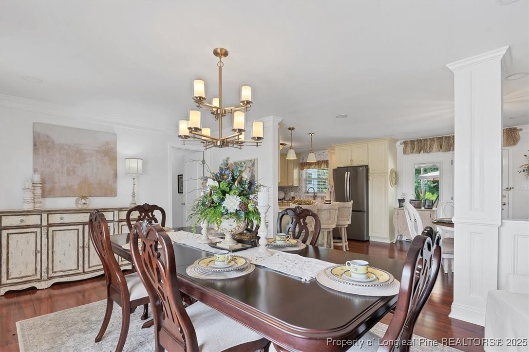 2483 West Carthage Road Lumberton, NC 28360 - Photo 10 of 50 a view of a dining room with furniture window and wooden floor
