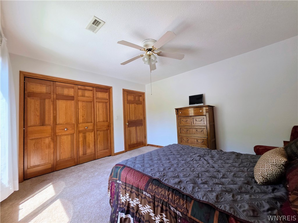 151 Chestnut Street Wilson, NY 14172 - Photo 22 of 30 Guest bedroom with custom closet organizers