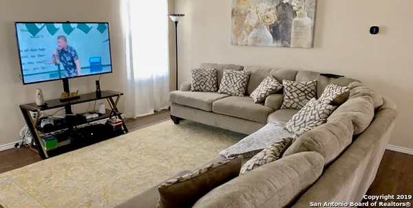 a living room with furniture and a couch