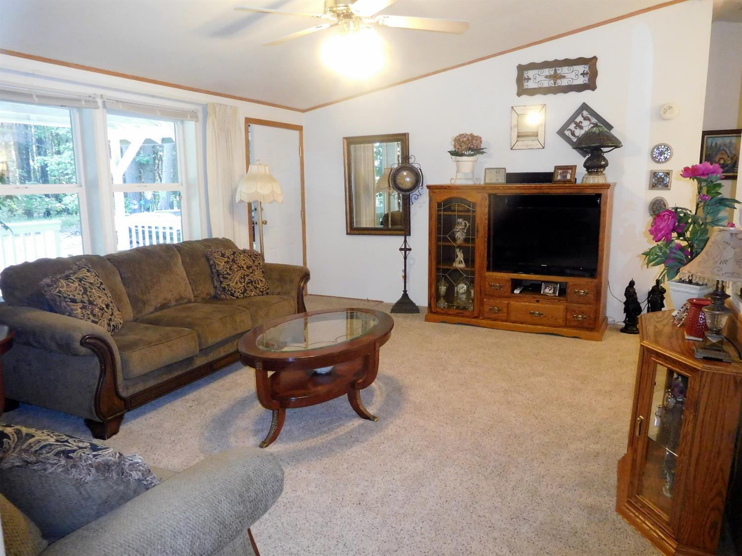 4933 Dick George Road Cave Junction, OR 97523 - Photo 14 of 22 View of living room towards front entry,