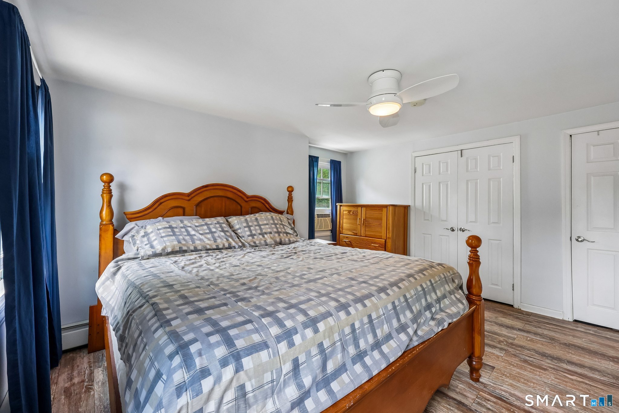21 Friendly Road Norwalk, CT 06851 - Photo 19 of 28 End room with space, walk-in closet and plenty of natural light through the windows, the primary bedroom gives you the perfect place to retreat to at the end of the day!
