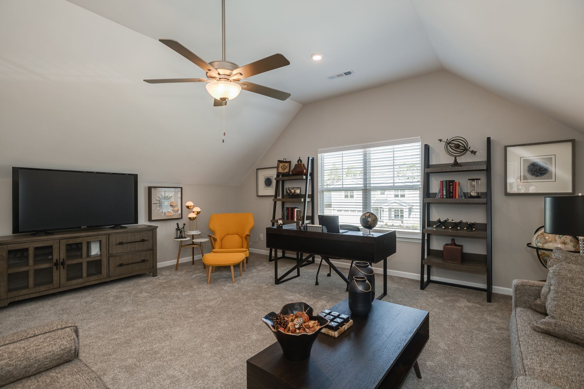 105 Einkorn Road Shelbyville, TN 37160 - Photo 5 of 6 a living room with furniture and a flat screen tv