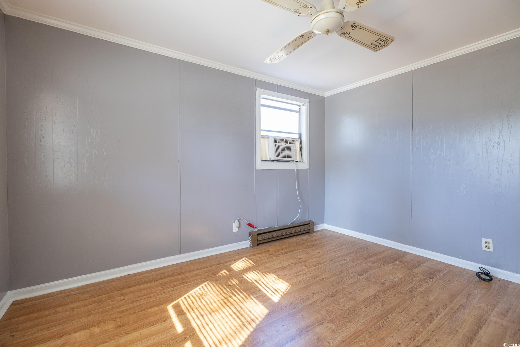101 County Rd S-22-732 Georgetown, SC 29440 - Photo 8 of 17 Unfurnished room featuring ceiling fan, baseboards