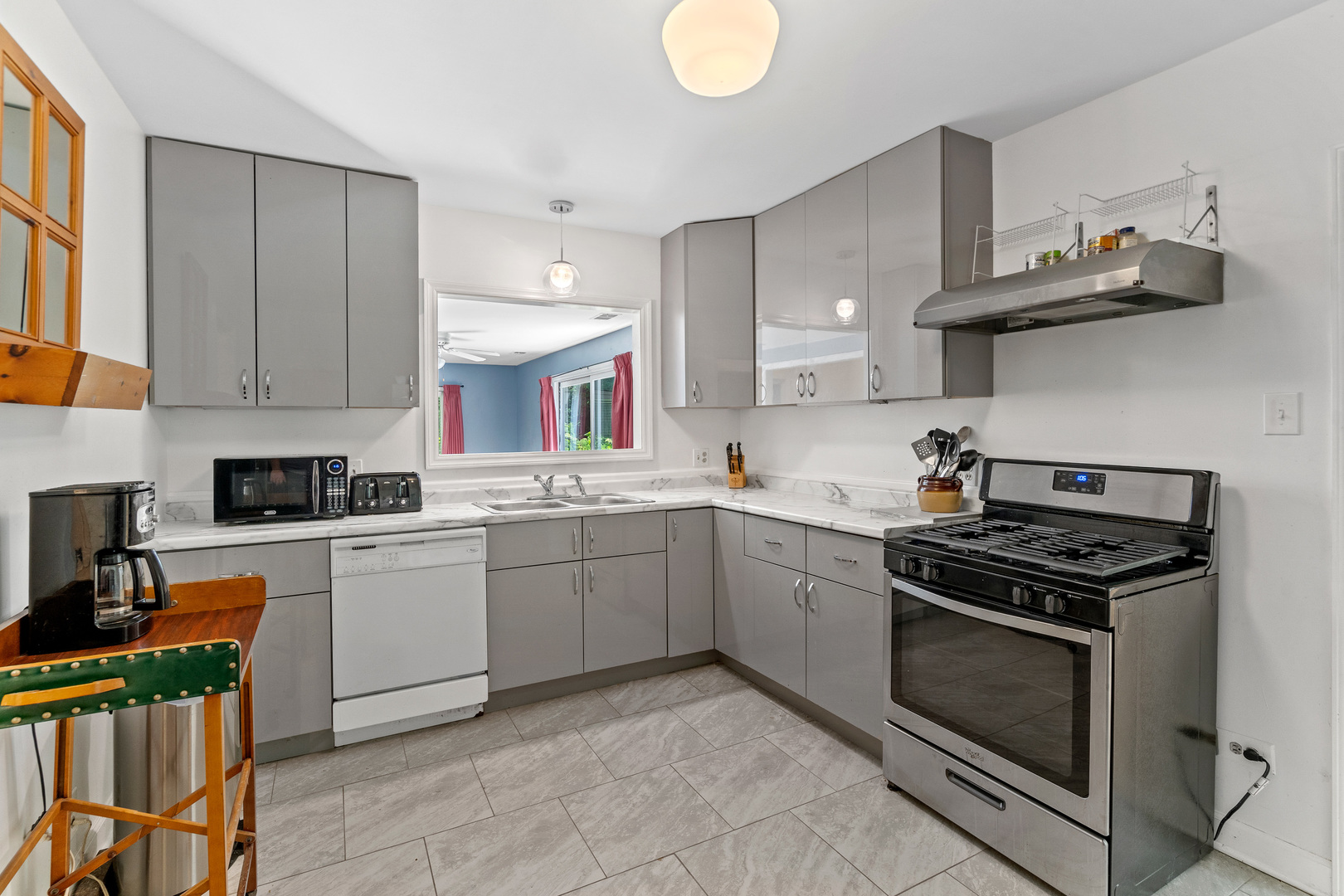 321 Newman Court Lake Bluff, IL 60044 - Photo 3 of 12 a kitchen with a stove sink and cabinets