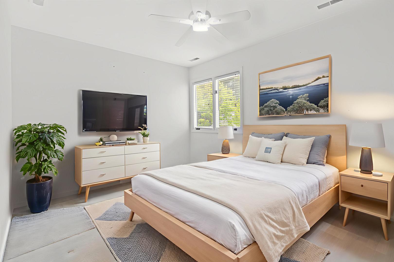 321 Newman Court Lake Bluff, IL 60044 - Photo 8 of 12 a bedroom with a bed and a flat screen tv