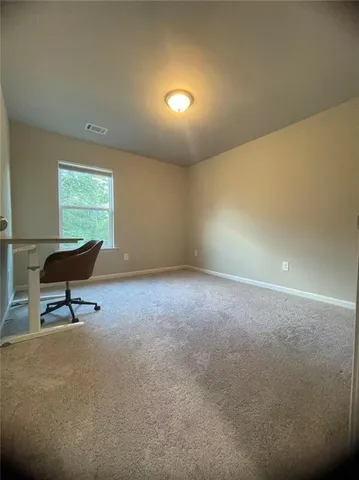 a view of a livingroom with a window