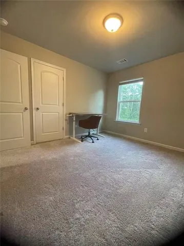 a view of a room with a small space