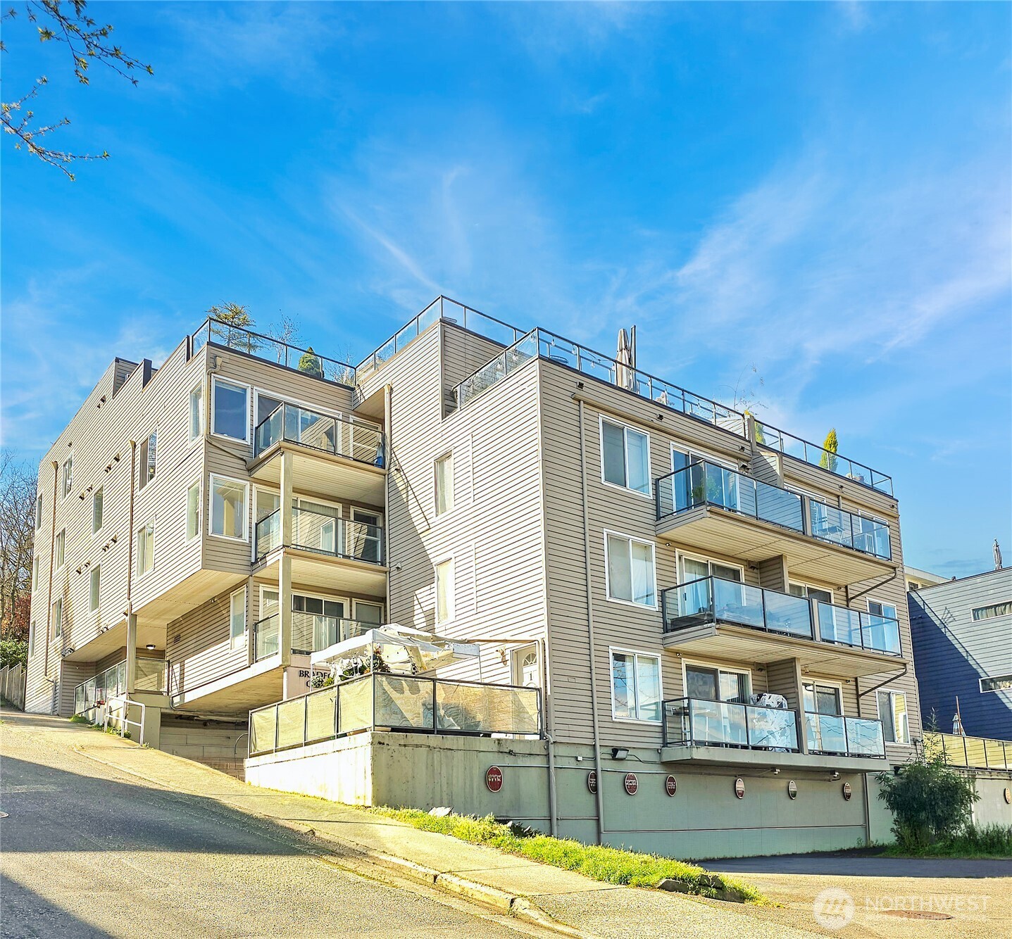 3022 Southwest Bradford Street, Unit 210 Seattle, WA 98126 - Photo 1 of 17 a front view of a building