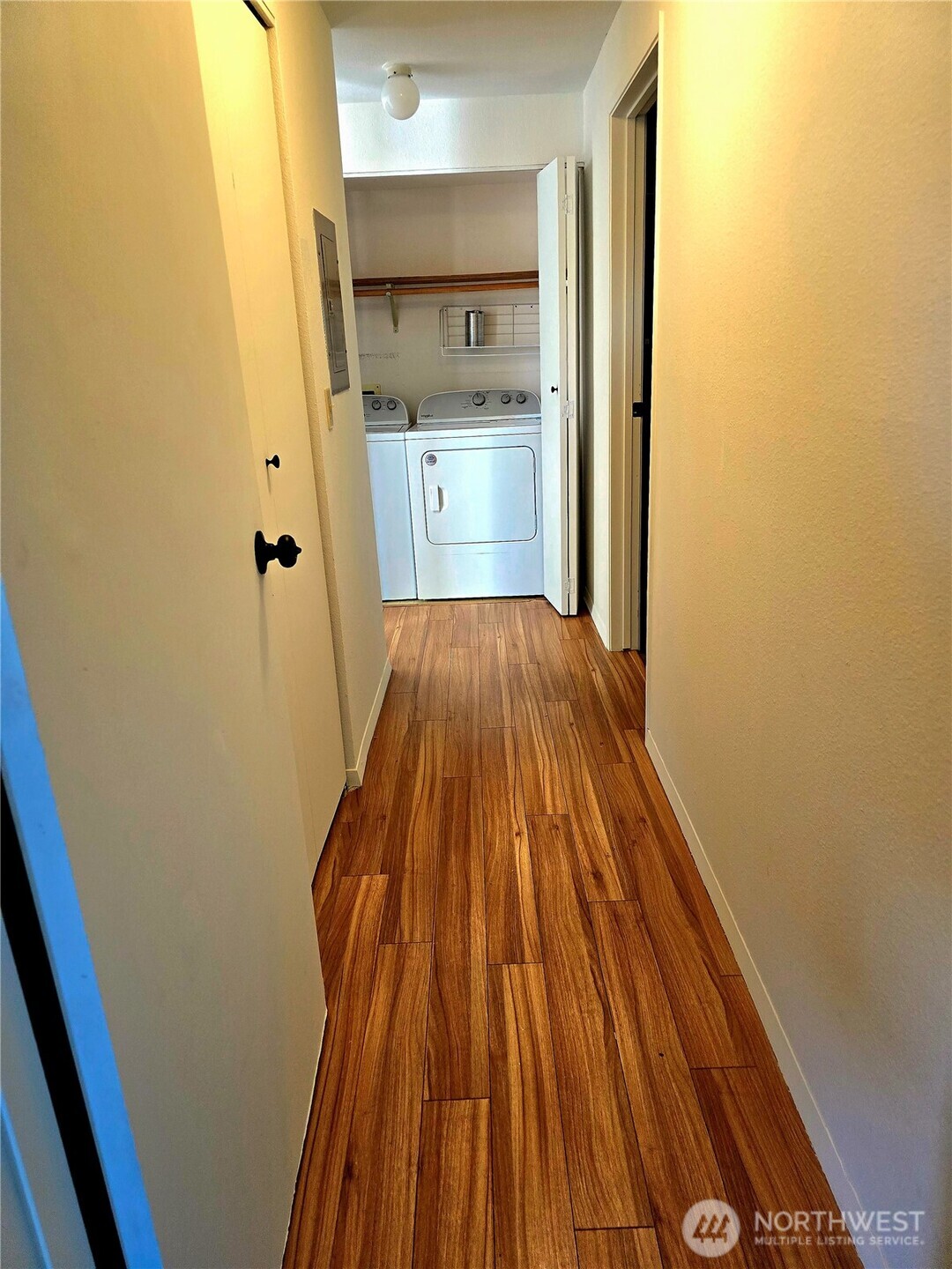 3022 Southwest Bradford Street, Unit 210 Seattle, WA 98126 - Photo 11 of 17 a bathroom with a sink and a mirror