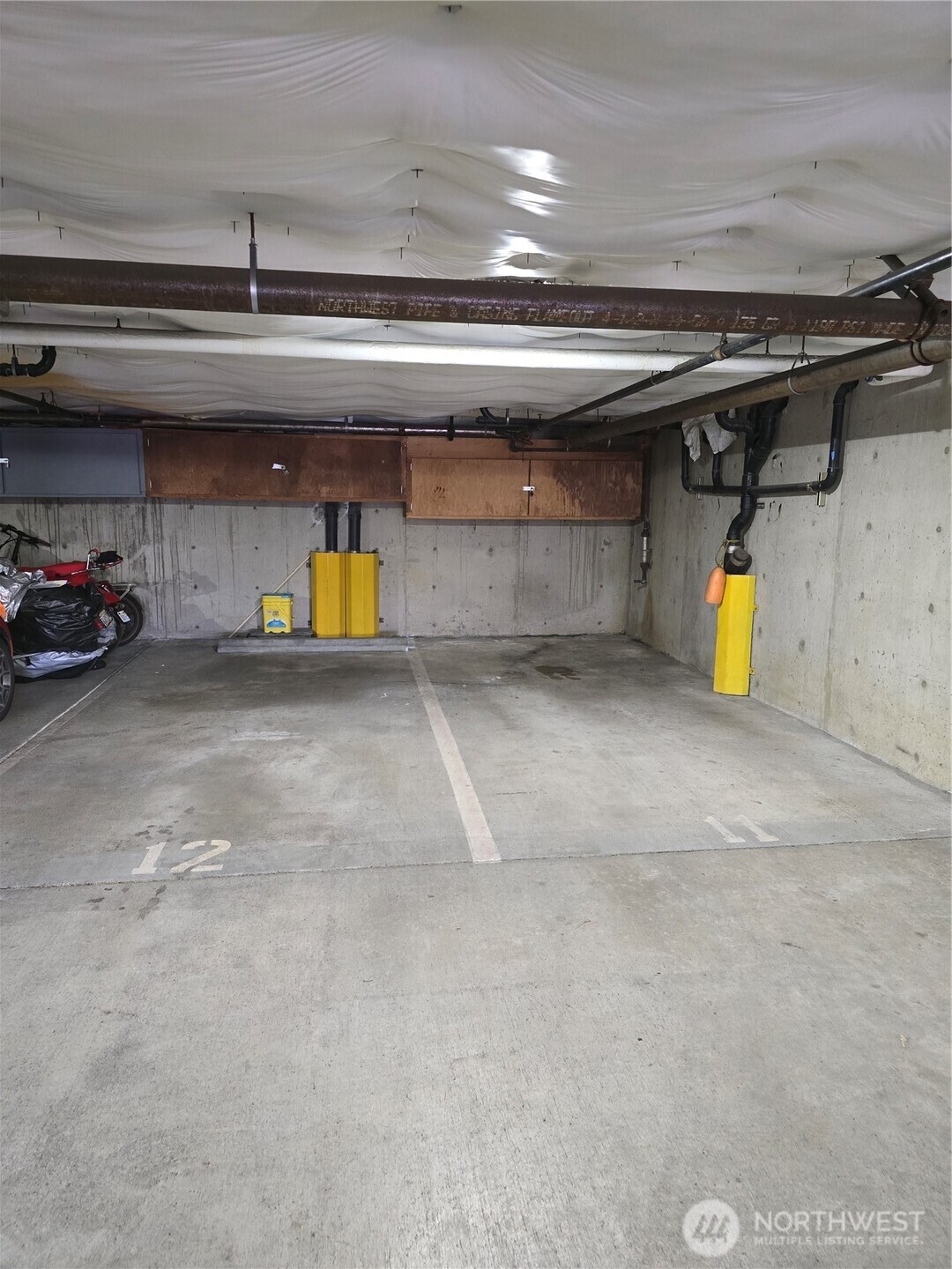 3022 Southwest Bradford Street, Unit 210 Seattle, WA 98126 - Photo 15 of 17 a view of parking garage