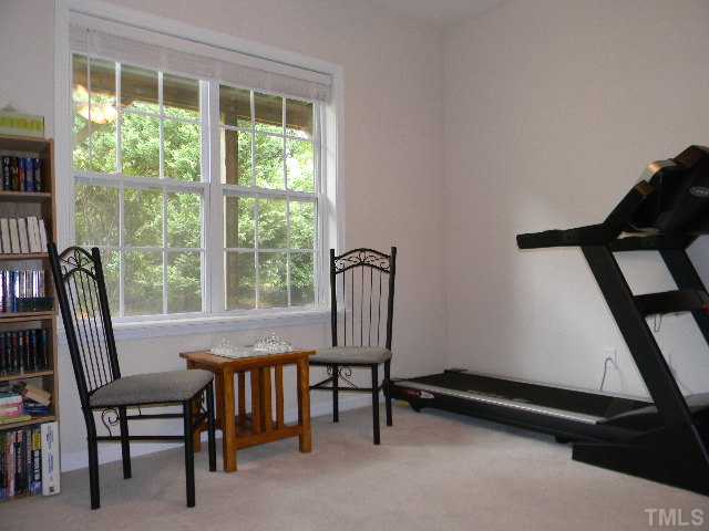 5504 Red Robin Road Raleigh, NC 27613 - Photo 3 of 18 Room is being used as an exercise room. It could be usewd as a Bonus room, office or game room.