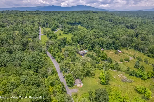 a front view of a house with a porch
