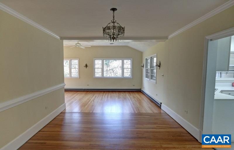1215 Rugby Road Charlottesville, VA 22903 - Photo 5 of 20 wooden floor in an empty room with a window