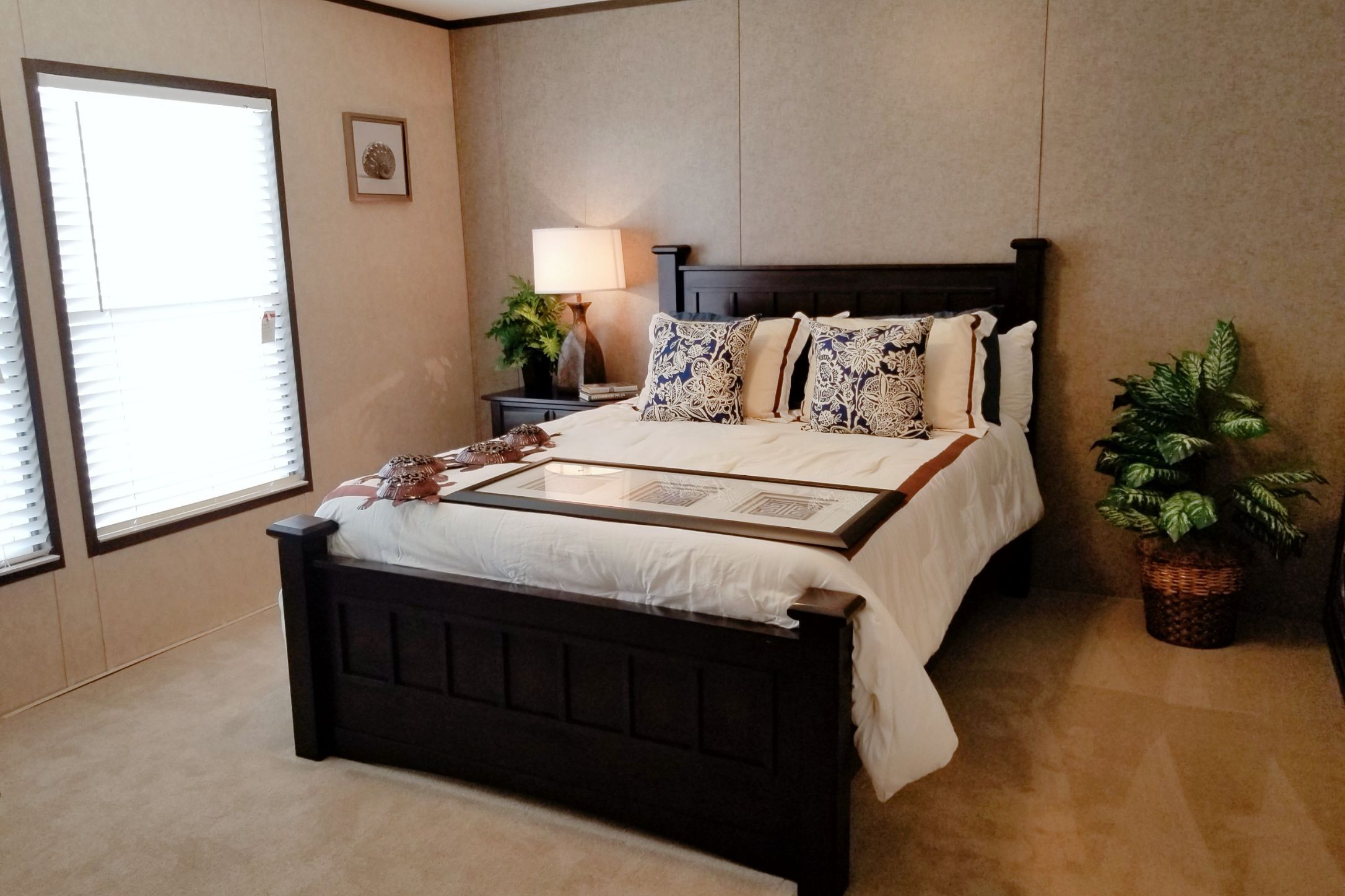 2409 County Road 313 Jarrell, TX 76537 - Photo 11 of 14 Bedroom featuring light carpet and a decorative wall
