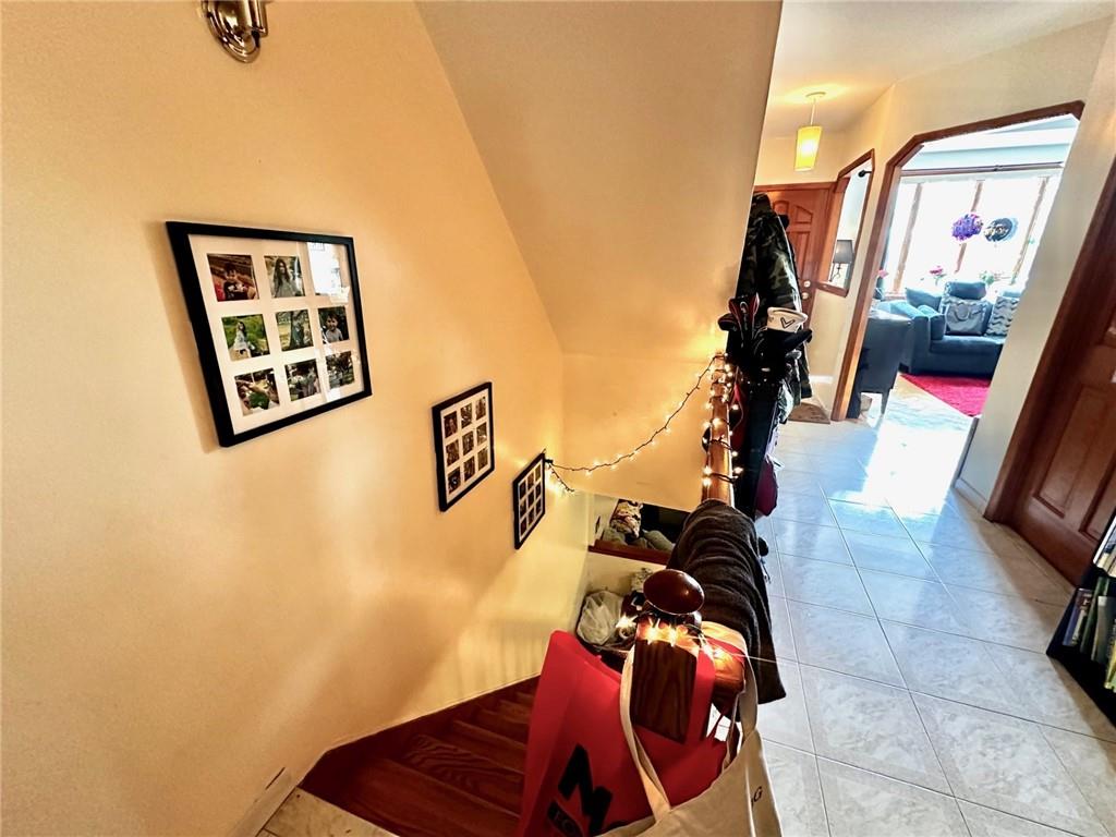 1453 85th Street Brooklyn, NY 11228 - Photo 6 of 18 a view of a hallway with windows and couch