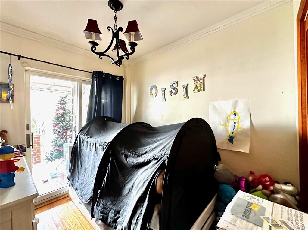 1453 85th Street Brooklyn, NY 11228 - Photo 10 of 18 a living room with furniture