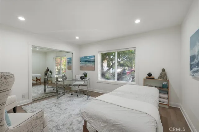 a view of a table and chairs in backyard of the house