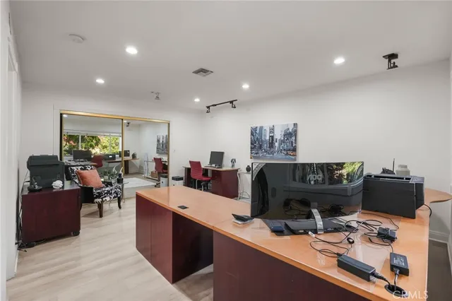 a view of a yard with palm trees