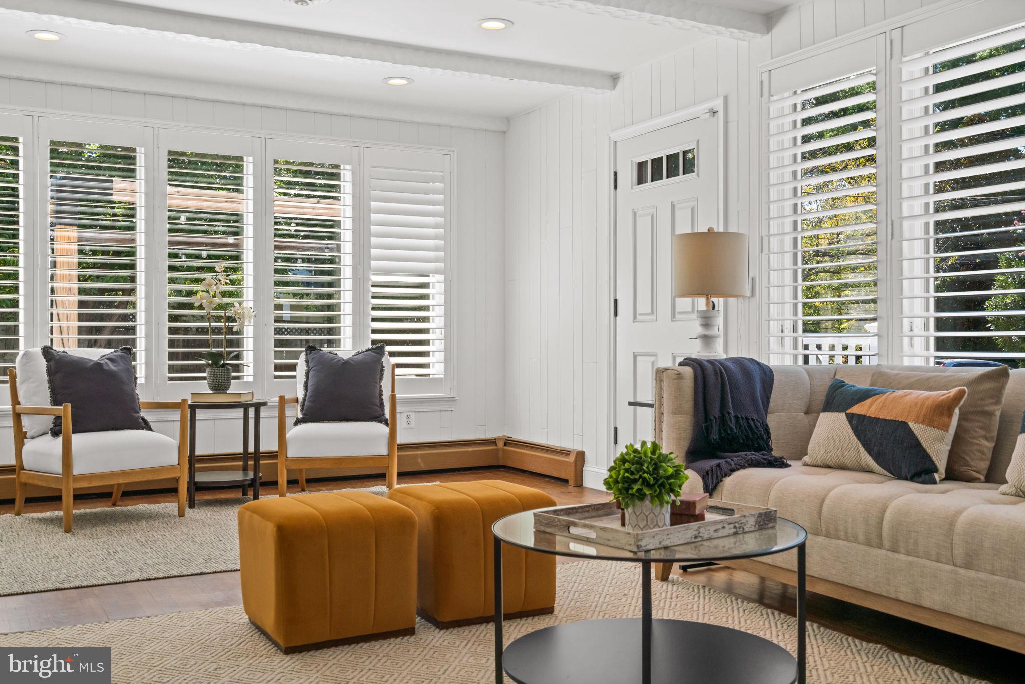 4900 Montgomery Avenue Bethesda, MD 20816 - Photo 21 of 57 a living room with furniture and a large window