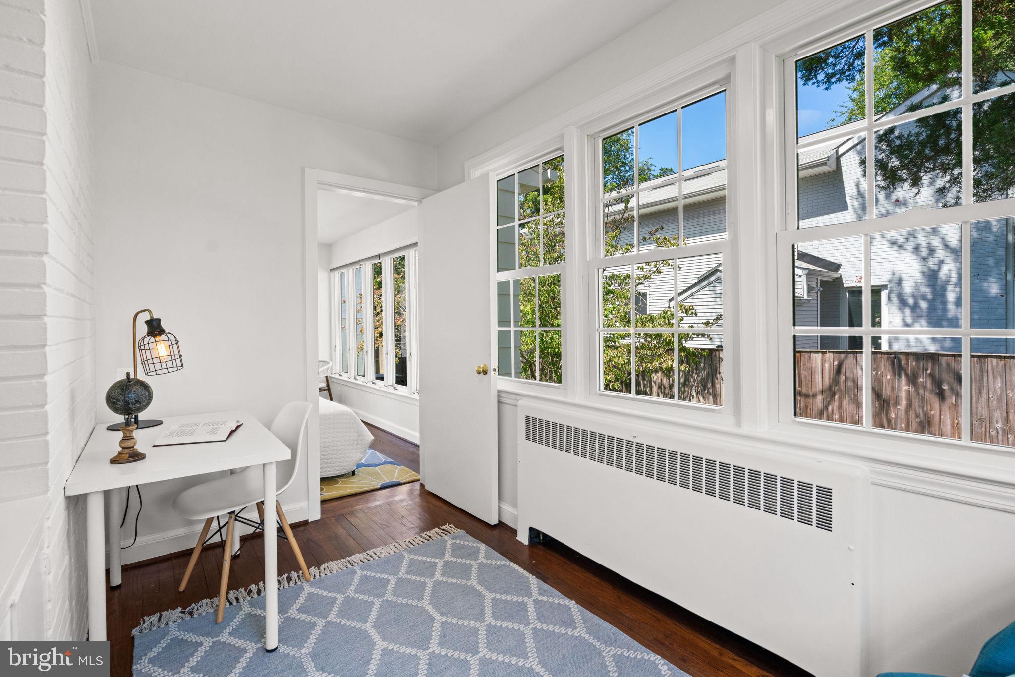 4900 Montgomery Avenue Bethesda, MD 20816 - Photo 22 of 57 a view of a dining room with furniture window and outside view