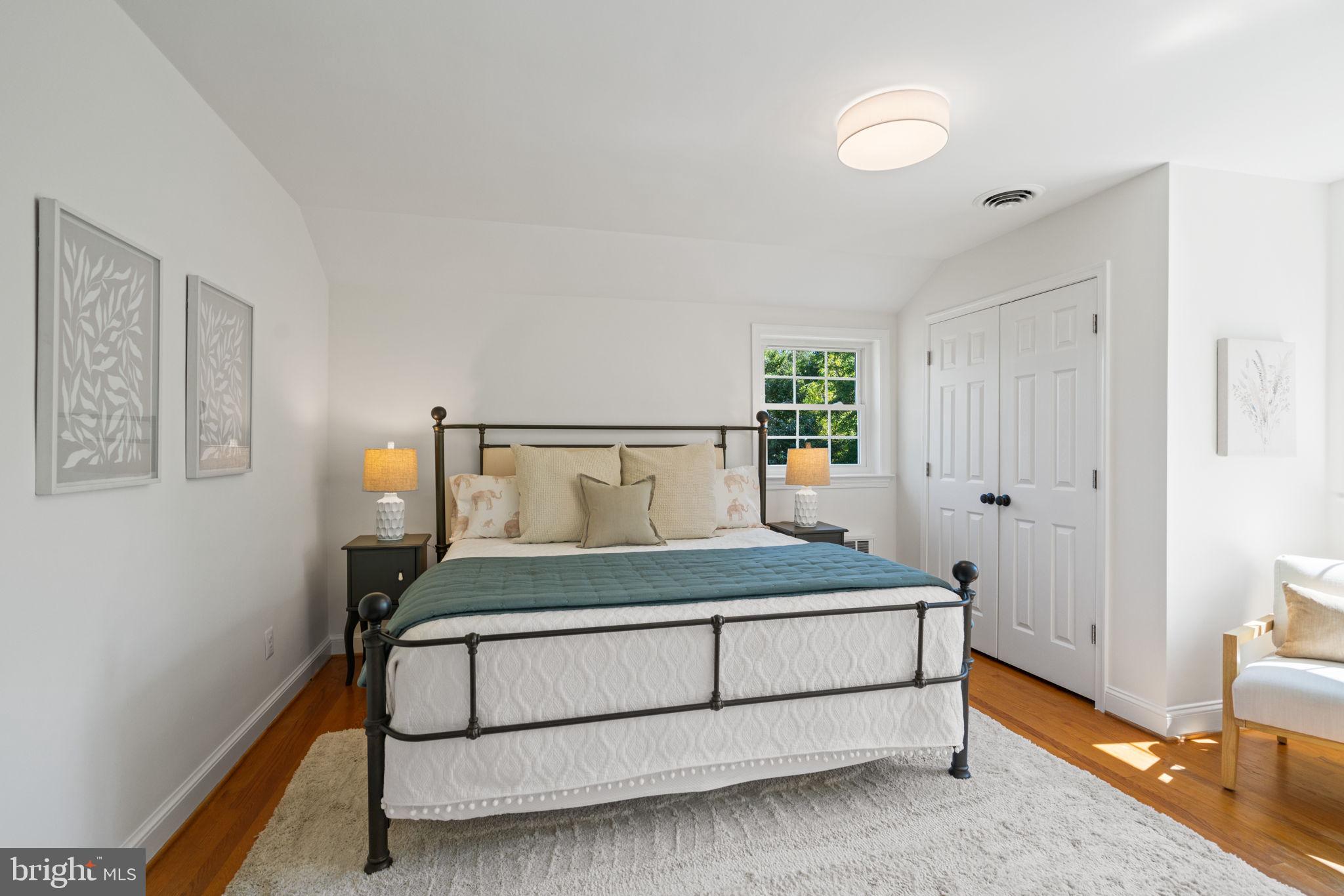 4900 Montgomery Avenue Bethesda, MD 20816 - Photo 26 of 57 a bedroom with a bed and window