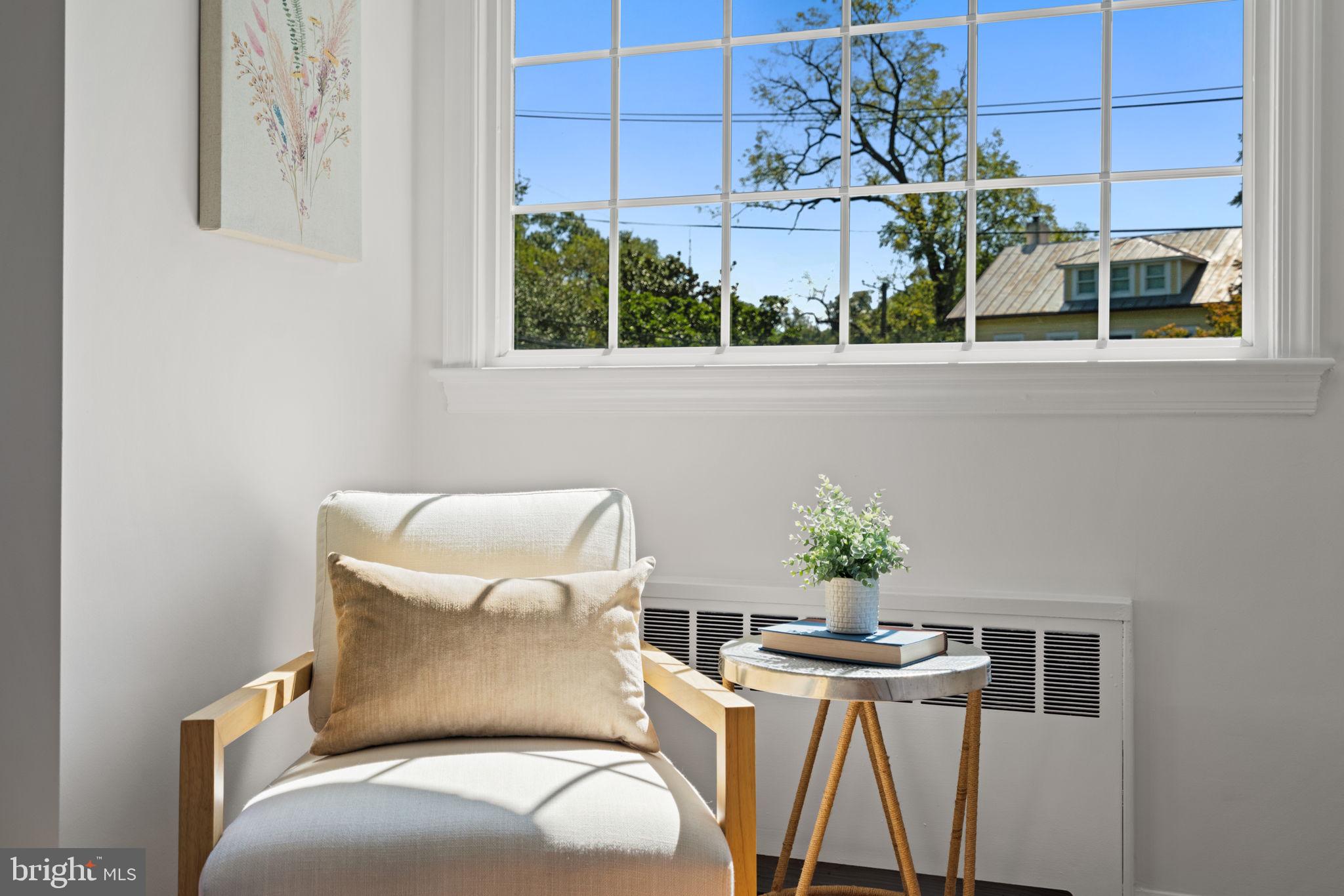 4900 Montgomery Avenue Bethesda, MD 20816 - Photo 27 of 57 a balcony with table and chairs