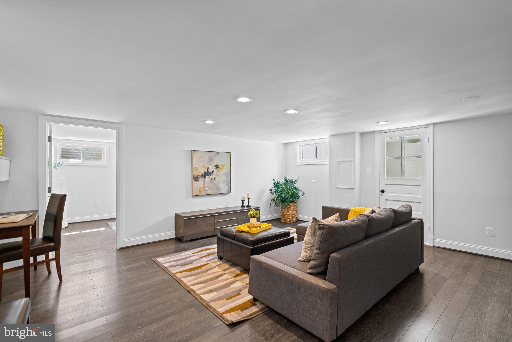 4900 Montgomery Avenue Bethesda, MD 20816 - Photo 39 of 57 a living room with furniture and wooden floor