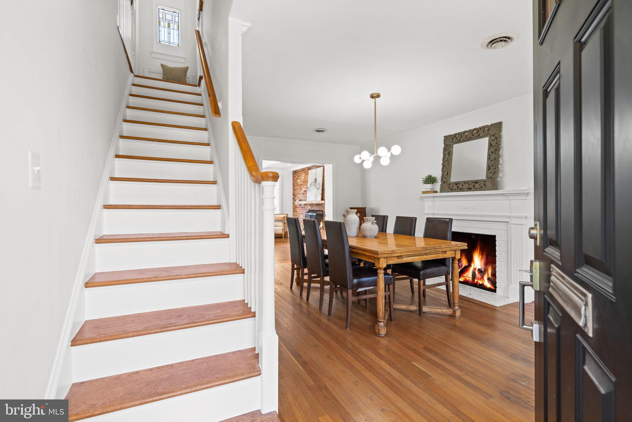 4900 Montgomery Avenue Bethesda, MD 20816 - Photo 4 of 57 a view of a dining room with furniture and wooden floor