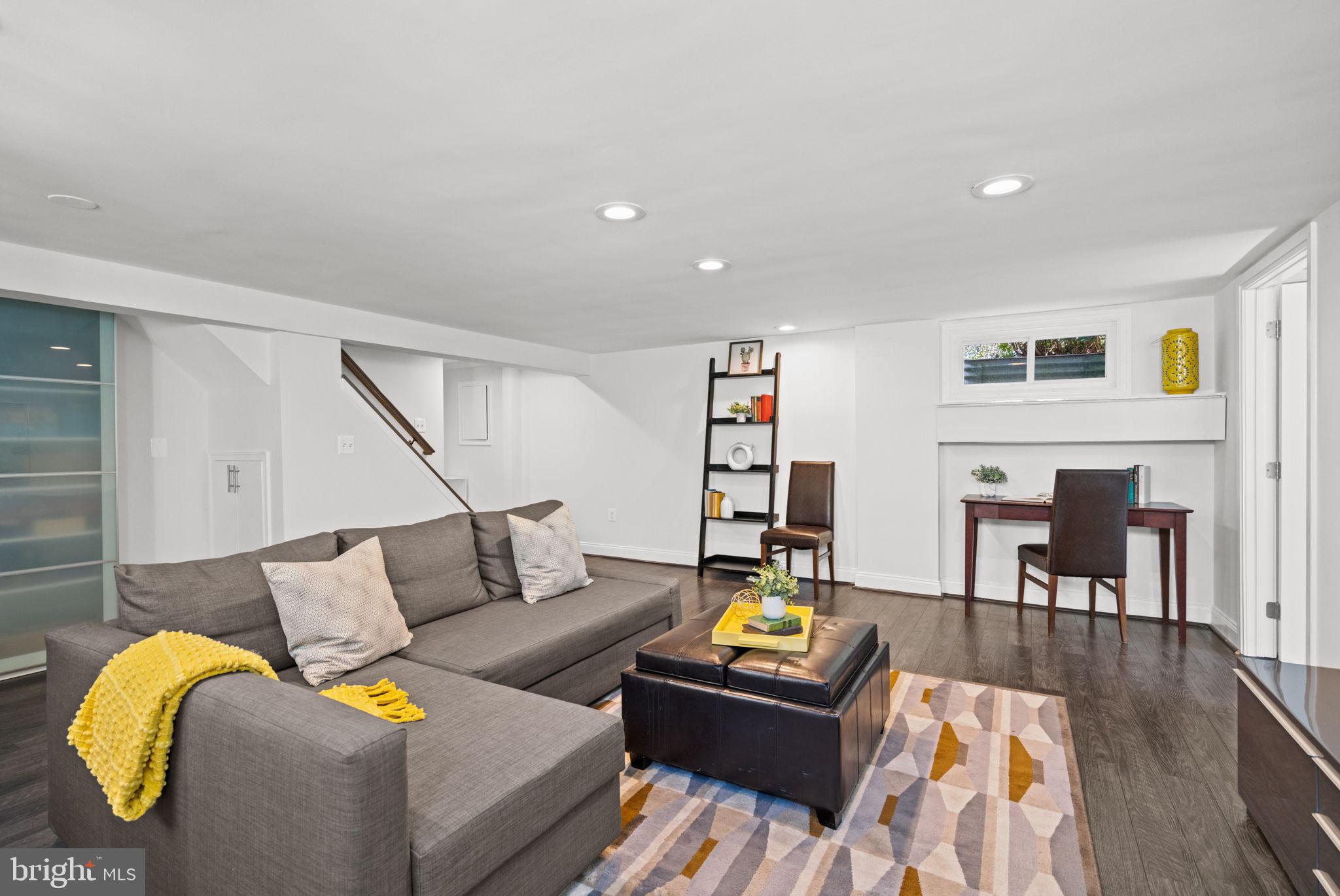 4900 Montgomery Avenue Bethesda, MD 20816 - Photo 41 of 57 a living room with furniture and a wooden floor