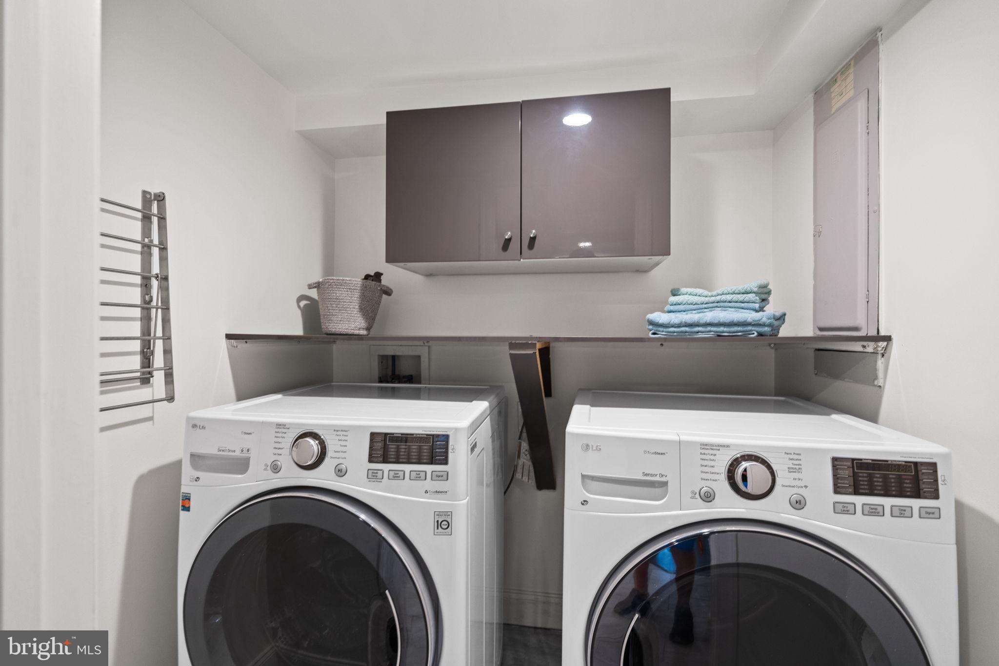 4900 Montgomery Avenue Bethesda, MD 20816 - Photo 45 of 57 a view of kitchen sink and washer dryer