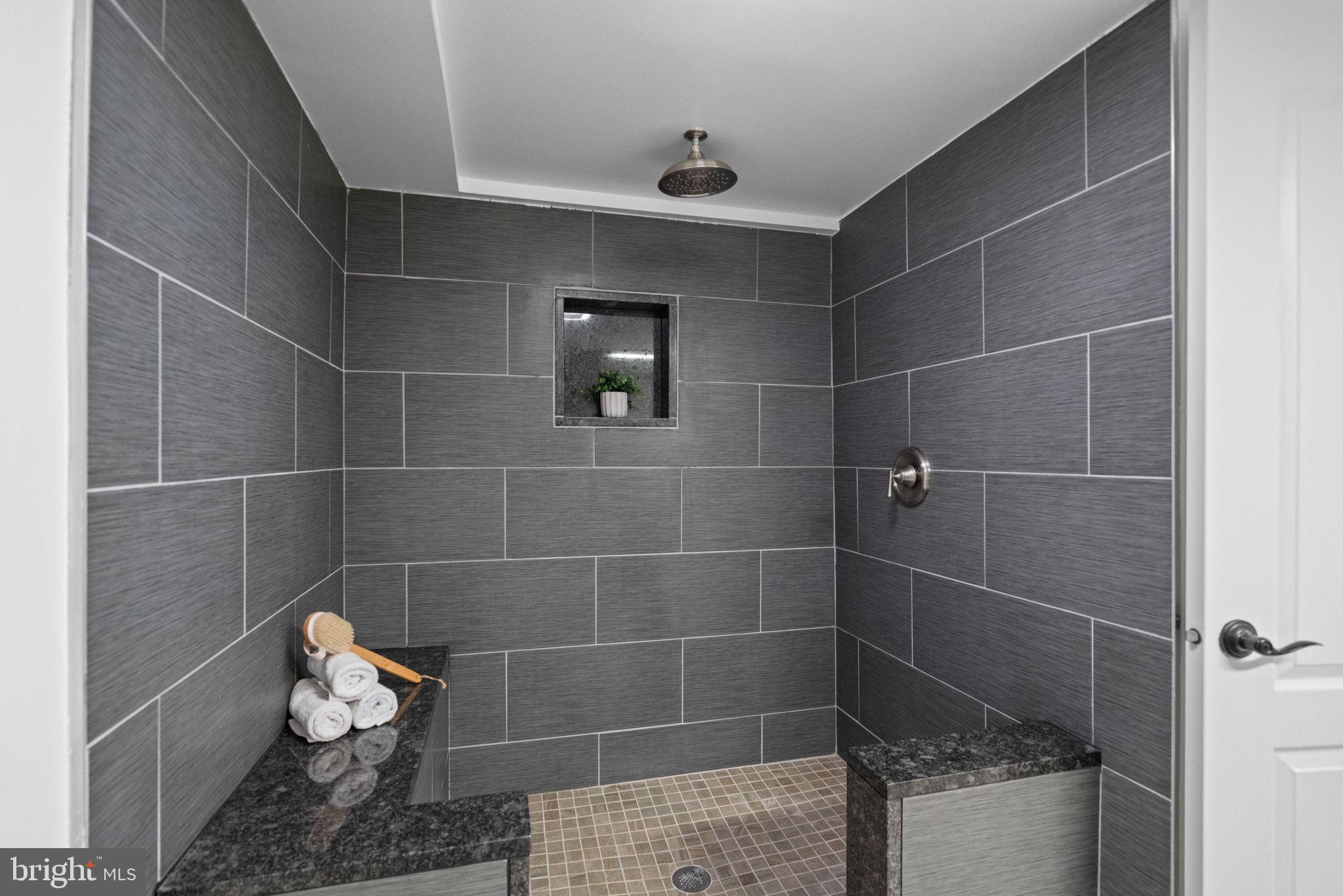 4900 Montgomery Avenue Bethesda, MD 20816 - Photo 47 of 57 a bathroom with a shower