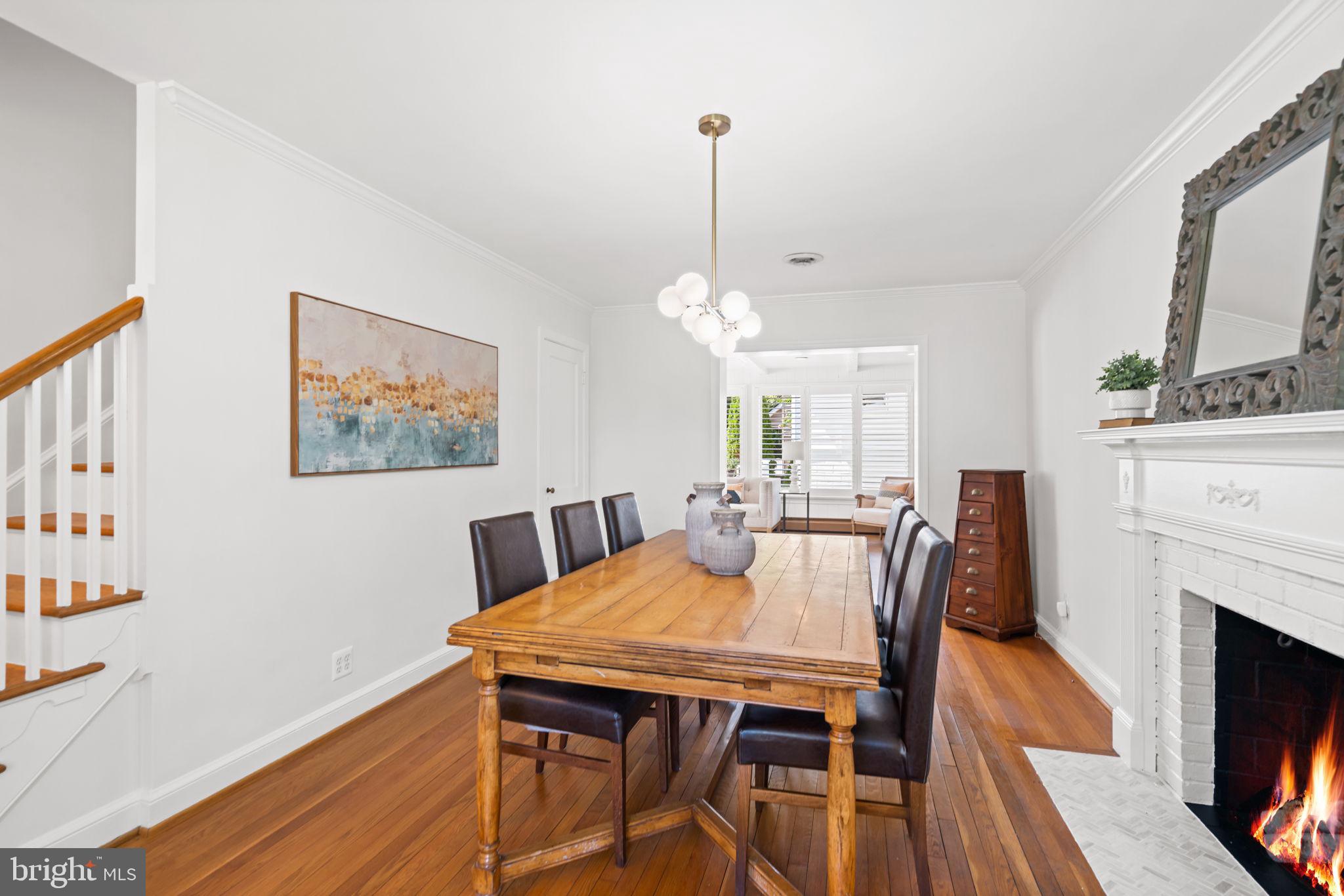 4900 Montgomery Avenue Bethesda, MD 20816 - Photo 5 of 57 a view of a dining room with furniture window and wooden floor