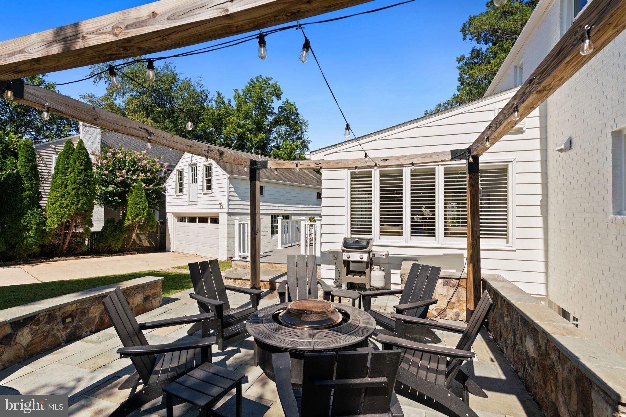 4900 Montgomery Avenue Bethesda, MD 20816 - Photo 52 of 57 a view of a balcony with chairs and potted plants