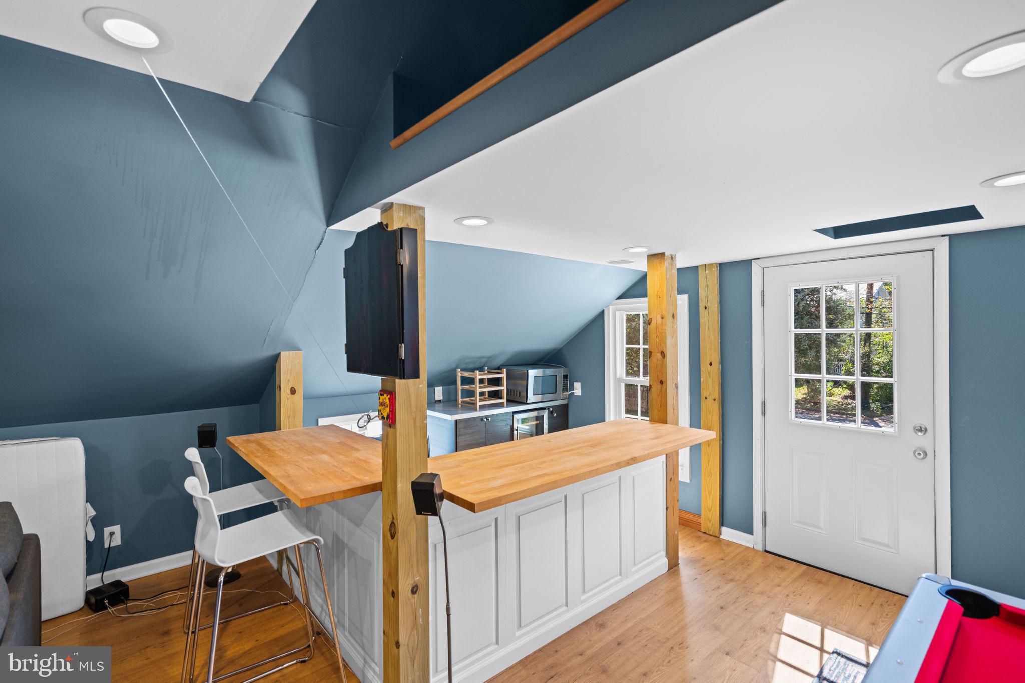 4900 Montgomery Avenue Bethesda, MD 20816 - Photo 57 of 57 a bedroom with furniture and a wooden floor