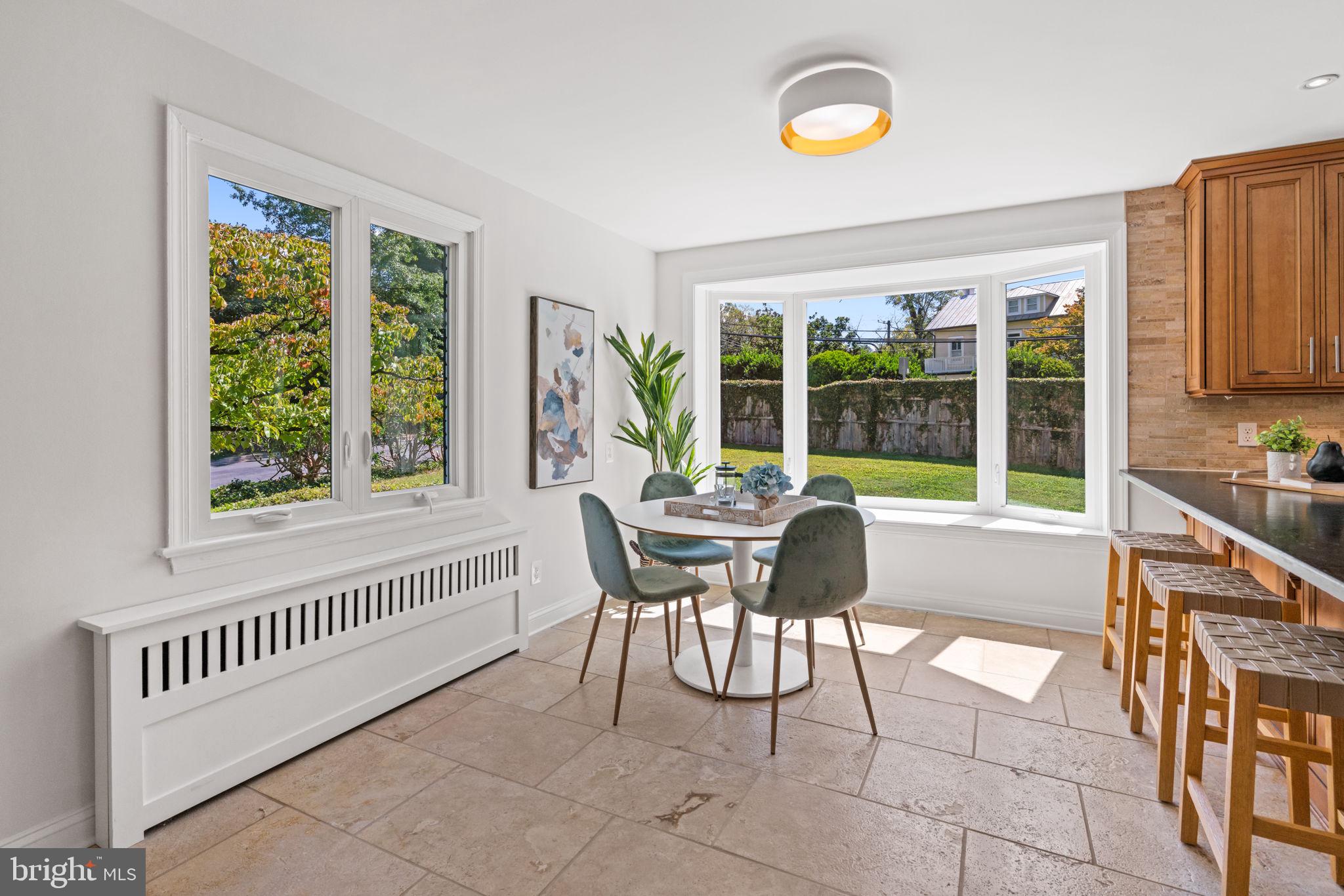 4900 Montgomery Avenue Bethesda, MD 20816 - Photo 8 of 57 a dining room with furniture and window