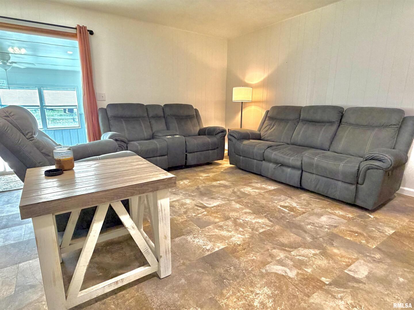 315 Hosselton Street Southwest Clay City, IL 62824 - Photo 14 of 70 a living room with furniture and a window