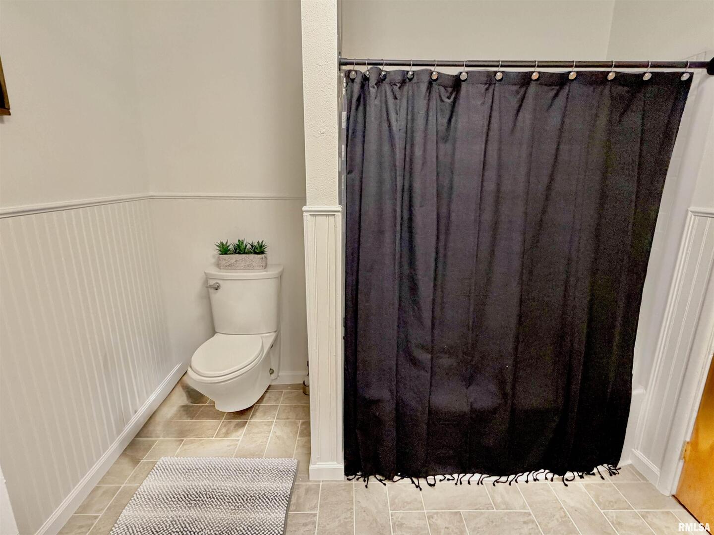 315 Hosselton Street Southwest Clay City, IL 62824 - Photo 27 of 70 a bathroom with a sink and a toilet