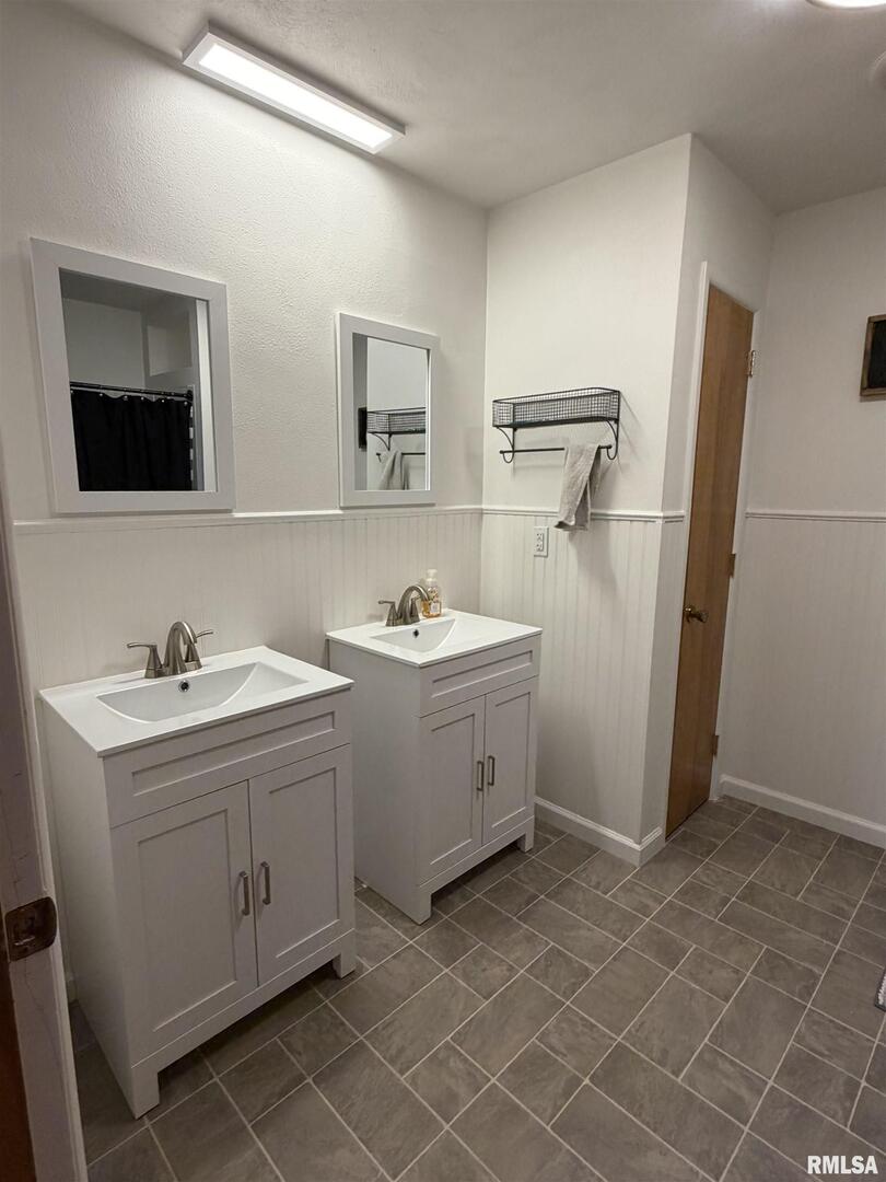 315 Hosselton Street Southwest Clay City, IL 62824 - Photo 4 of 70 a view of a storage utility room with a sink