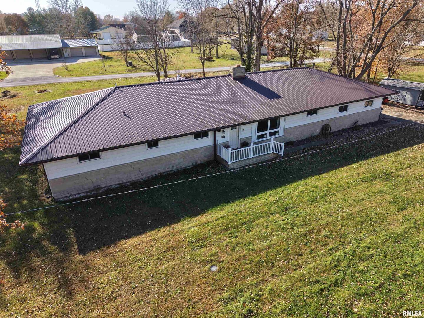315 Hosselton Street Southwest Clay City, IL 62824 - Photo 54 of 70 a view of a house with a swimming pool