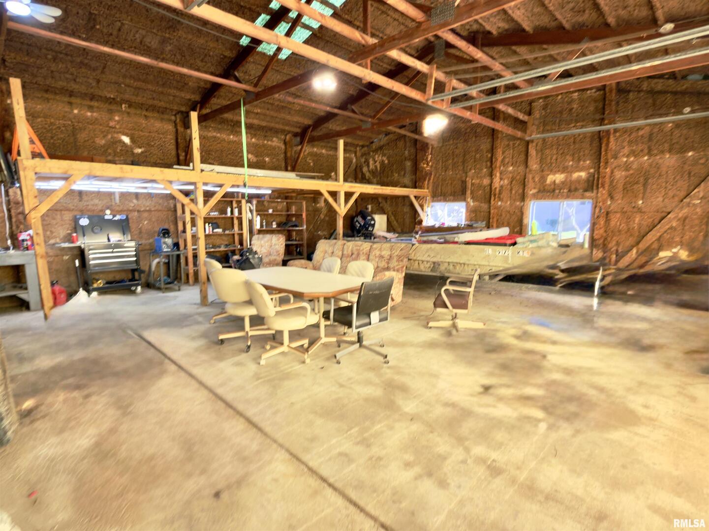 315 Hosselton Street Southwest Clay City, IL 62824 - Photo 60 of 70 a view of a patio with a table and chairs