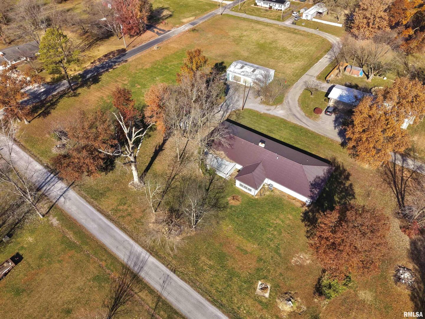 315 Hosselton Street Southwest Clay City, IL 62824 - Photo 66 of 70 a view of a yard with an outdoor space