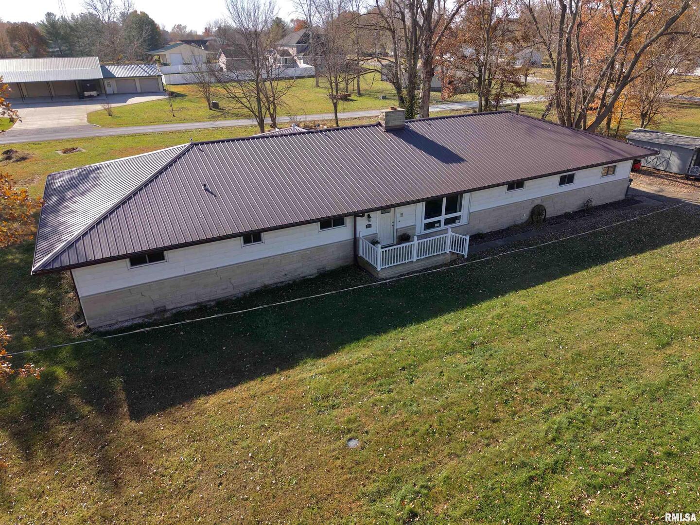 315 Hosselton Street Southwest Clay City, IL 62824 - Photo 68 of 70 a view of a house with a swimming pool